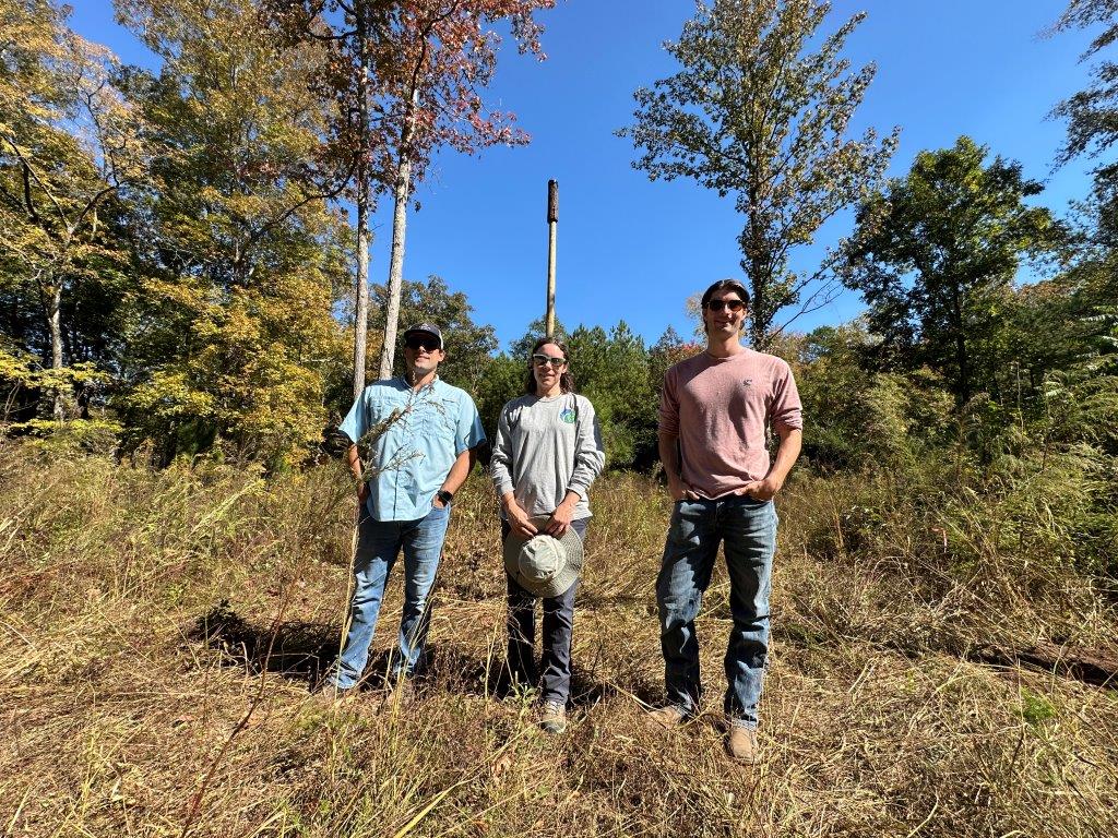 Members of both the Georgia-Alabama Land Trust and Alabama Power installed bat houses at Weaver Cave Preserve.